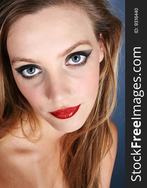 Beautiful young female model with dark make-up