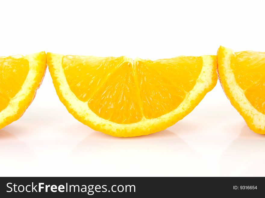 Orange quarters isolated against a white background