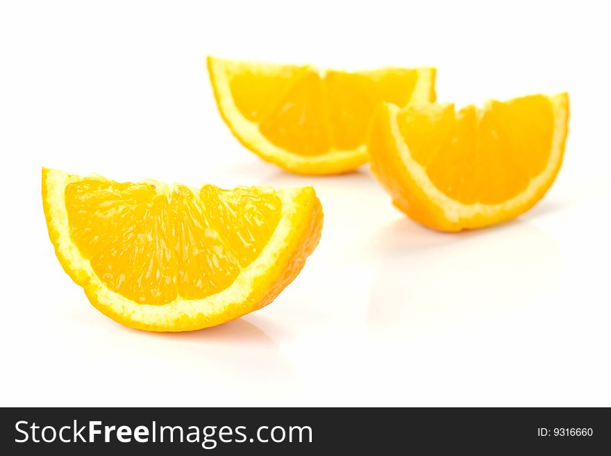 Orange quarters isolated against a white background