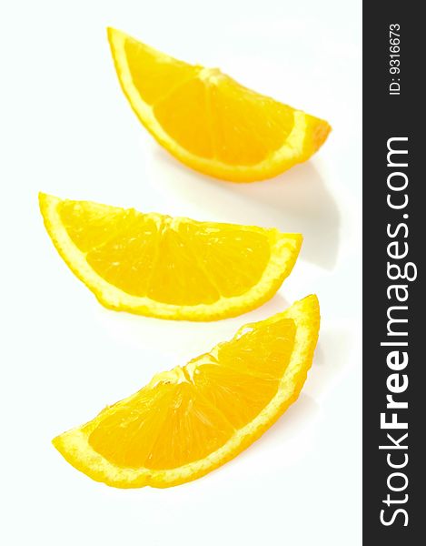 Orange quarters isolated against a white background