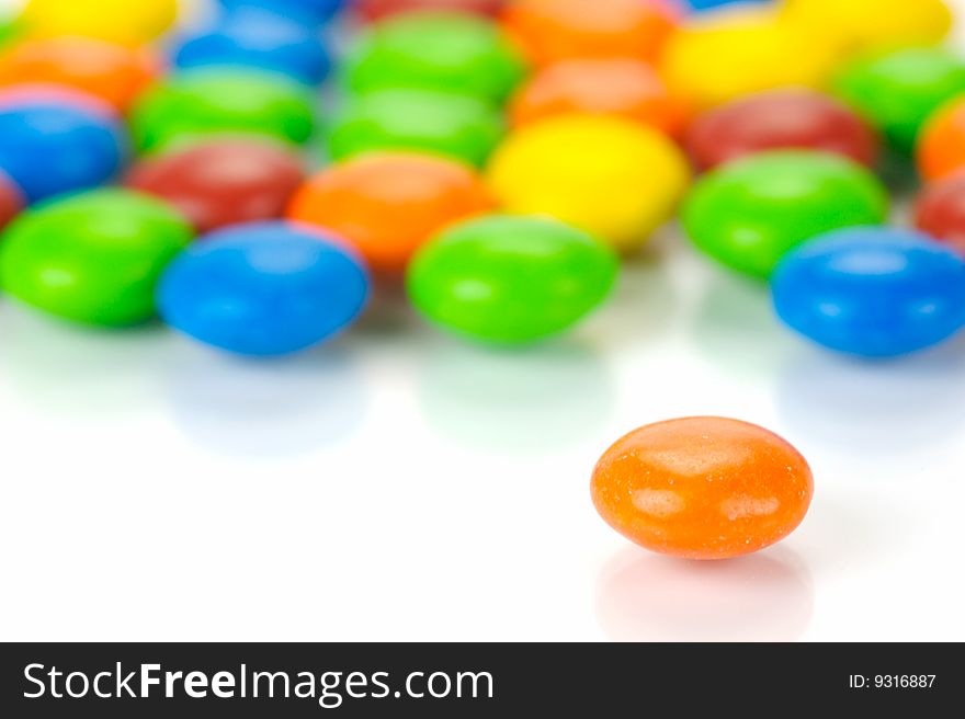 Chocolate coated candy isolated against a white background. Chocolate coated candy isolated against a white background