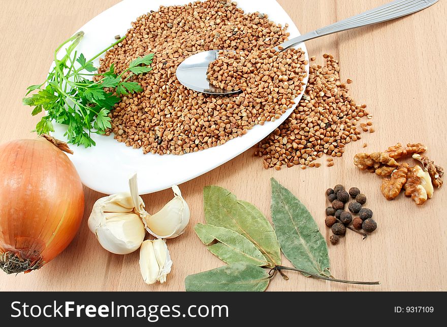 An ingredients for a boiled buckwheat separated on a table