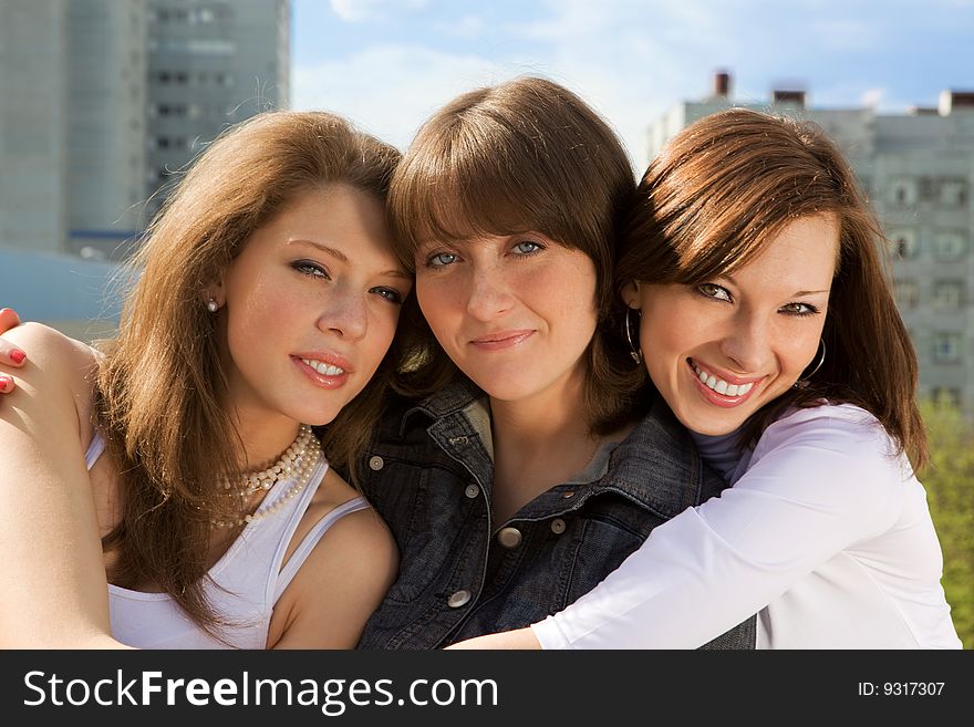 Three Happy Cute Young Girls