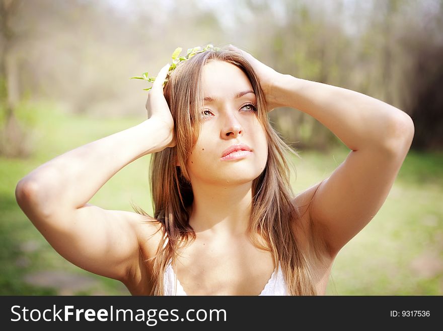 pretty young woman in natural background. pretty young woman in natural background