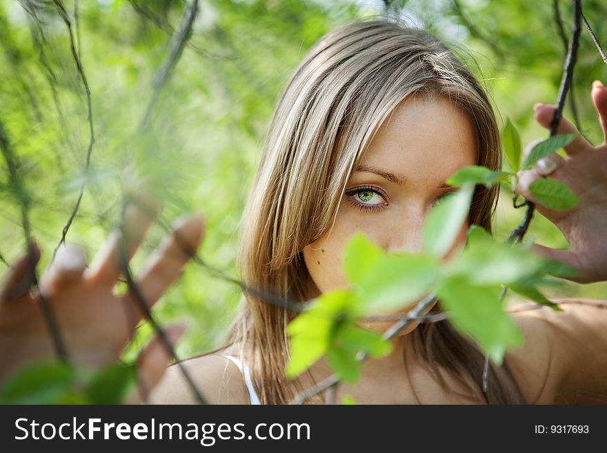 Portrait of a beautiful young lady in natural background