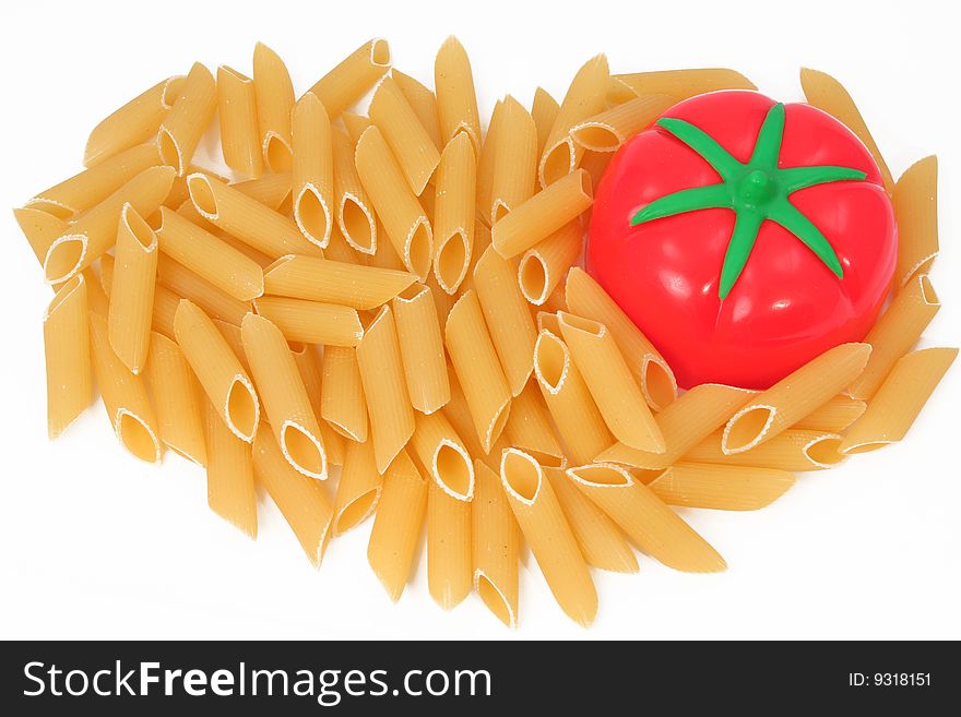 Macaroni with a tomato on a white background