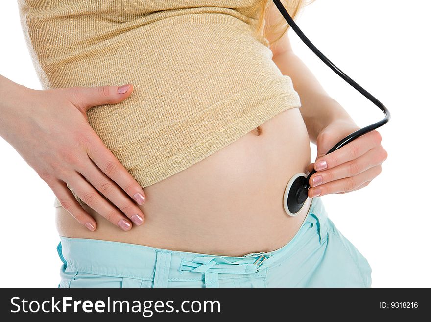 Pregnant Woman Listening To Belly Stethoscope