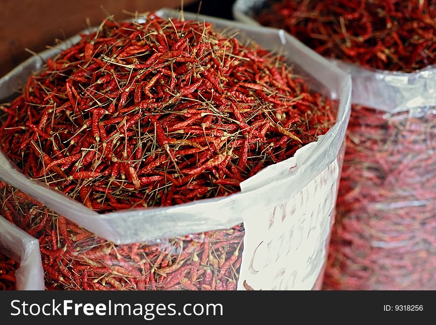A sack of dried chilli pepper at asian market. A sack of dried chilli pepper at asian market