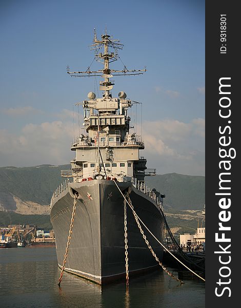 Military cruiser on parking in sea port