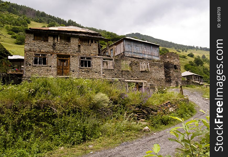 Big brick house on the hill in Swanetia, Georgia Caucasus mountain