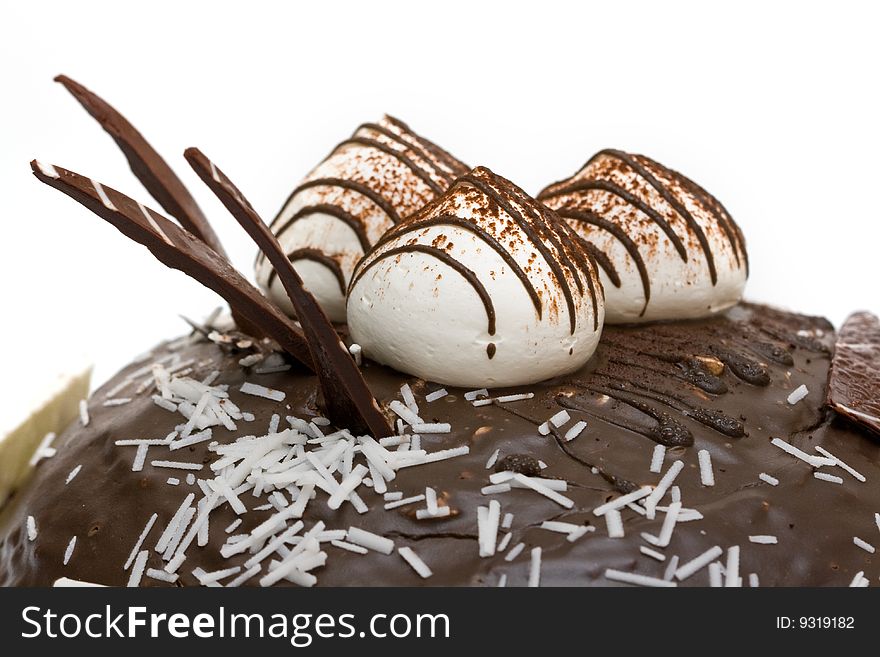 Chocolate cake with whiped cream isolated on white