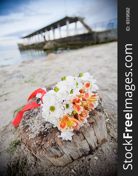 Bridal bouquet outdoors on the beach