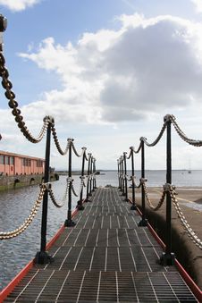A Dock Gates With A Chain Fence Stock Photo