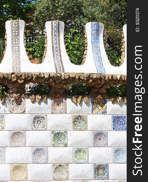 Details of colorful design of mosaic in Park Guell, Barcelona, Spain