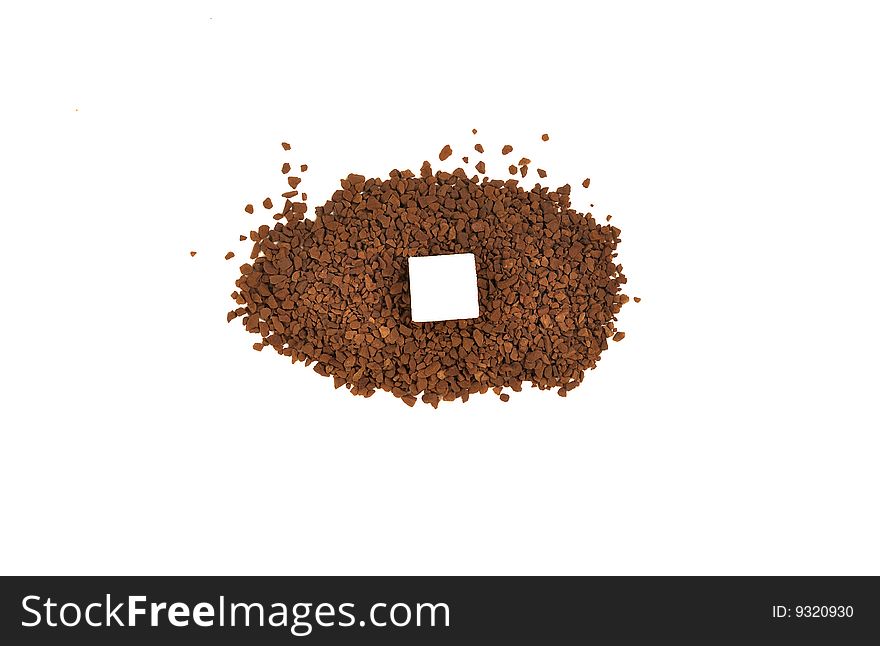 Instant coffee with an integral piece of sugar. Instant coffee with an integral piece of sugar