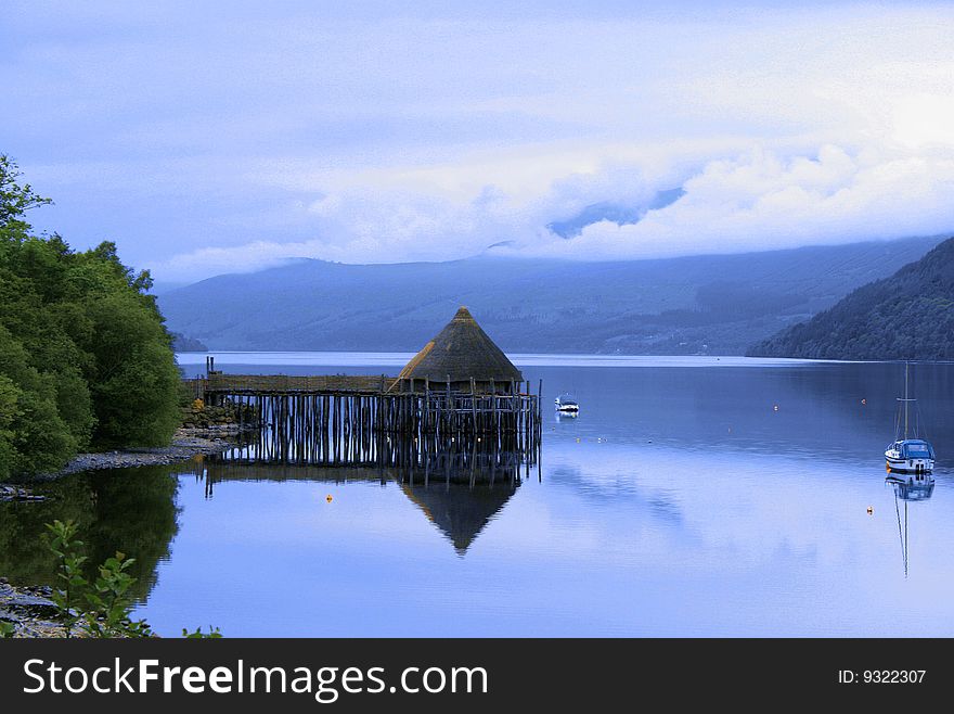 Ancient Crannog on a Scottish loch. Ancient Crannog on a Scottish loch