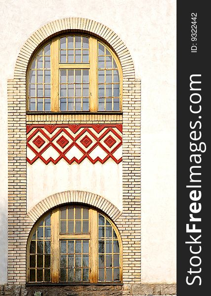 Window on a old facade with red bricks. Window on a old facade with red bricks