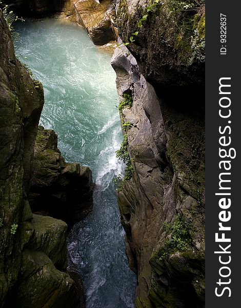 Scroll of a stream between the rocks. Scroll of a stream between the rocks