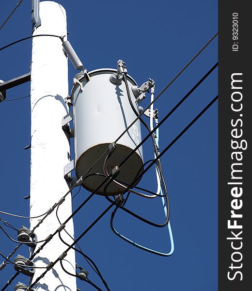 Hydro transformer against blue sky