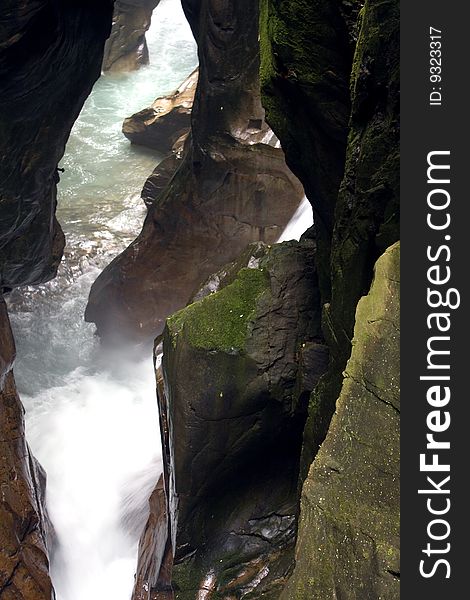 Scroll of a stream between the rocks. Scroll of a stream between the rocks