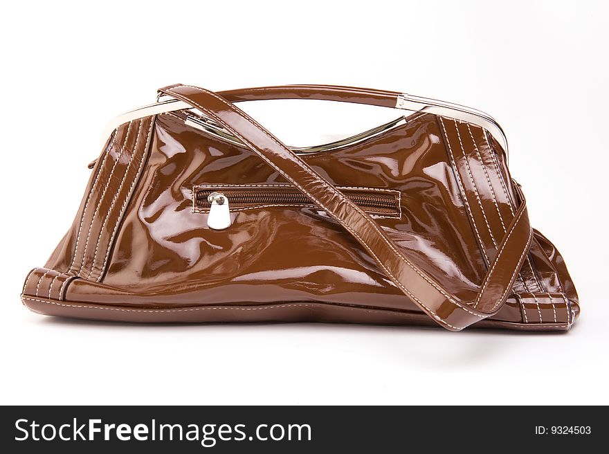 Brown imitation leather bag, isolated on a white background. Brown imitation leather bag, isolated on a white background