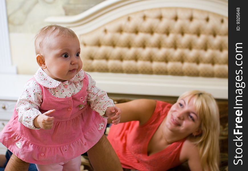 Portrait of little baby with mom