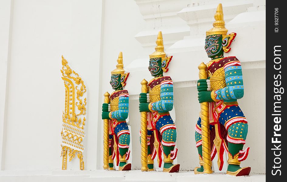 Giant statues around pagoda of Wat Pitchayatikaram, Bangkok, Thailand. Giant statues around pagoda of Wat Pitchayatikaram, Bangkok, Thailand