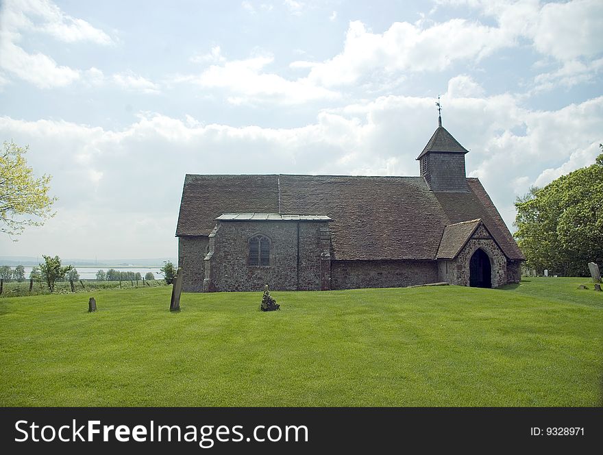 The Church of St Thomas the Apostle is famous because of it's isolated location it has no electricity, on the Isle of Harty kent England.