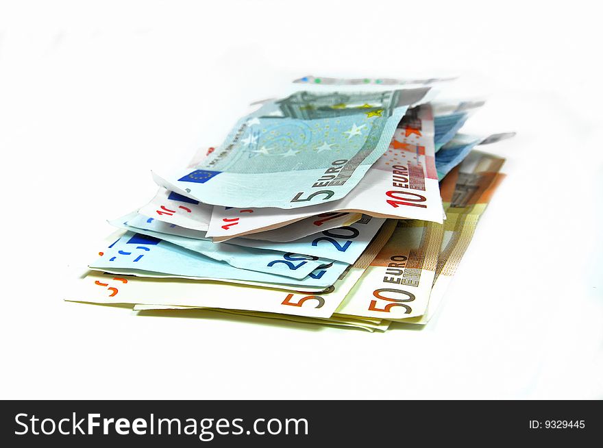 Stack of Euro banknotes isolated on white