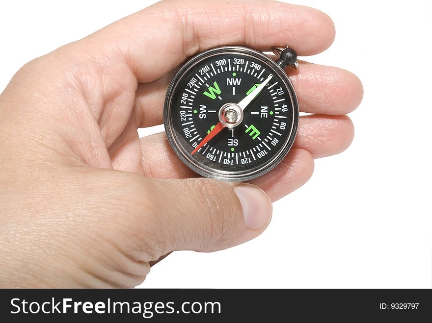Compass in palm is insulated on white background. Compass in palm is insulated on white background