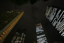Skyscrapers In Tokyo At Night From Below Royalty Free Stock Photos