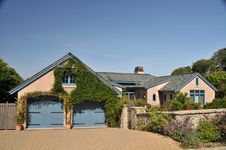 U Shaped House With Rock Fence Royalty Free Stock Photography U Shaped House With Rock Fence Royalty Free Stock Photography