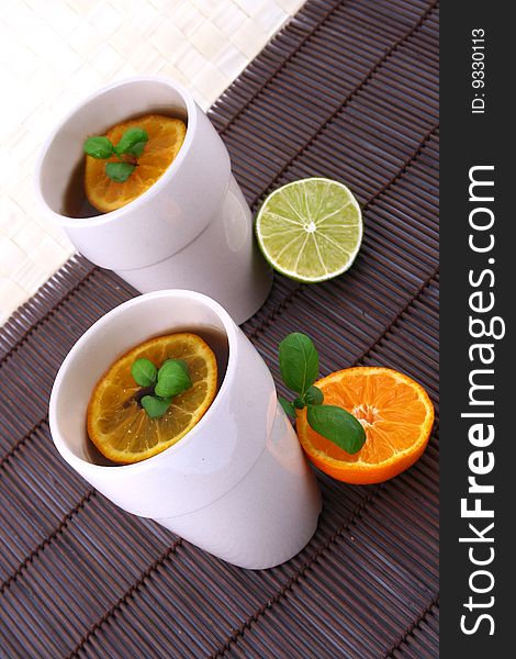 Tea with fruits and fresh mint