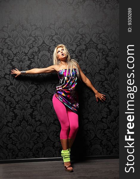 Modern style dancer posing on studio background. Modern style dancer posing on studio background