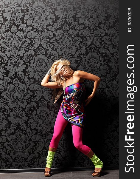 Modern style dancer posing on studio background. Modern style dancer posing on studio background