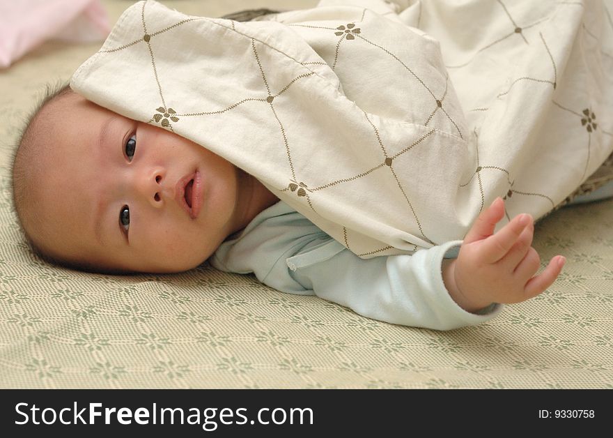 It is a cute chinese baby. he is 5 months. It is a cute chinese baby. he is 5 months.