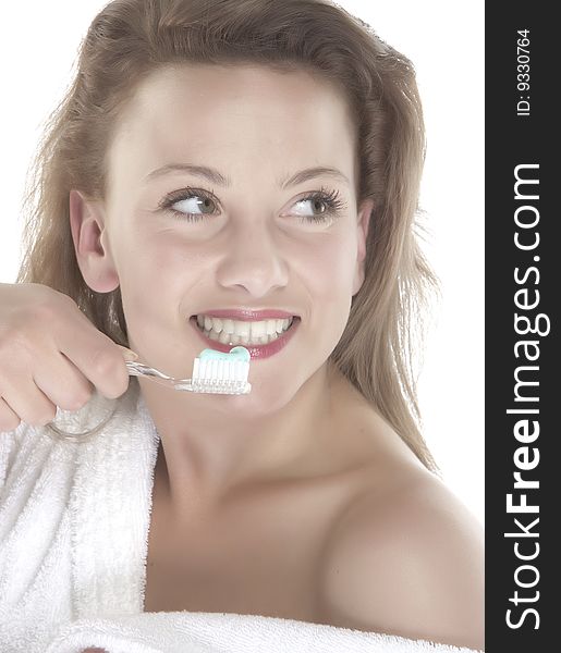 Girl who wash their teeth on white background