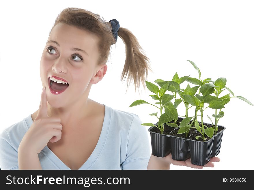 Girl Holding Young Plants