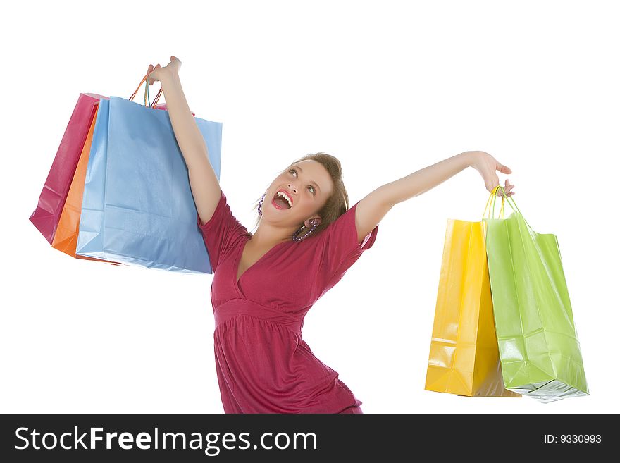 Attractive Young Woman Holding Several Shoppingba