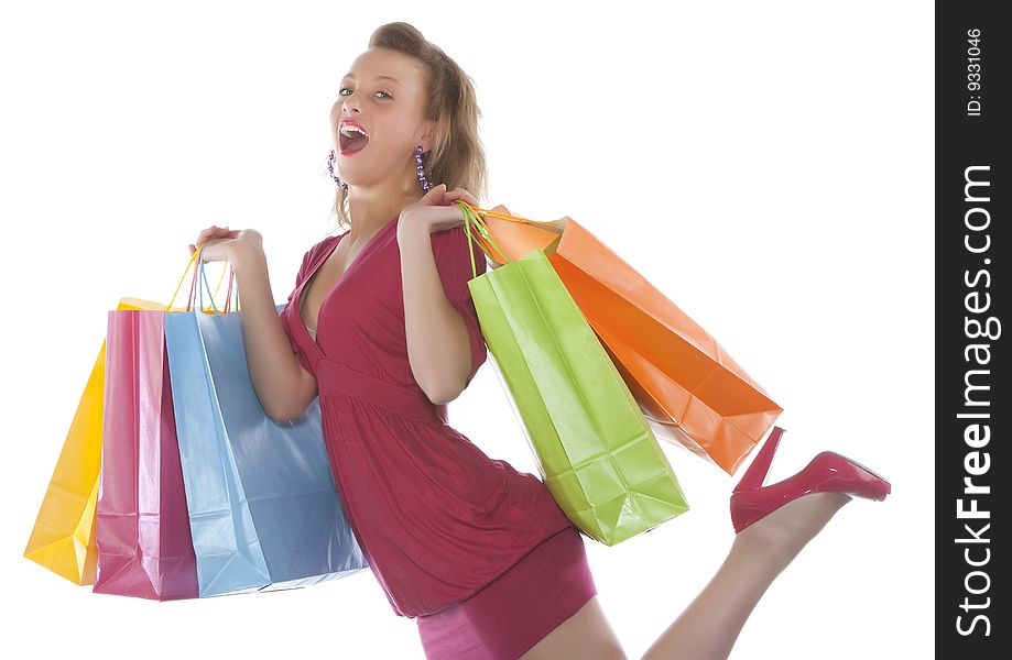 Attractive Young Woman Holding Several Shoppingba