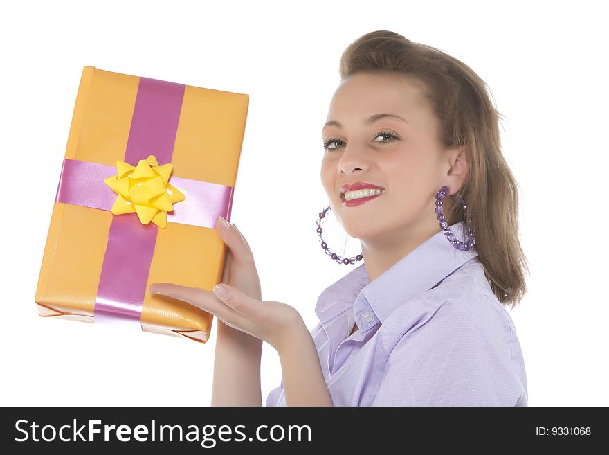 Beautiful young smiling girl with present