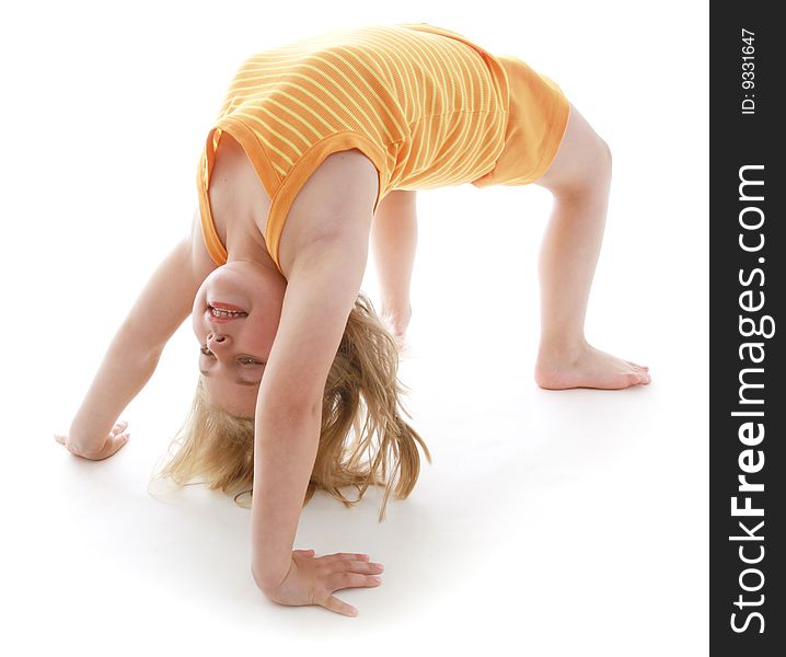 Cute little girl wearing orange.