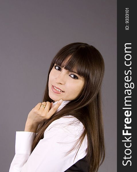 A close-up of a attractive business woman with fringe hair. A close-up of a attractive business woman with fringe hair