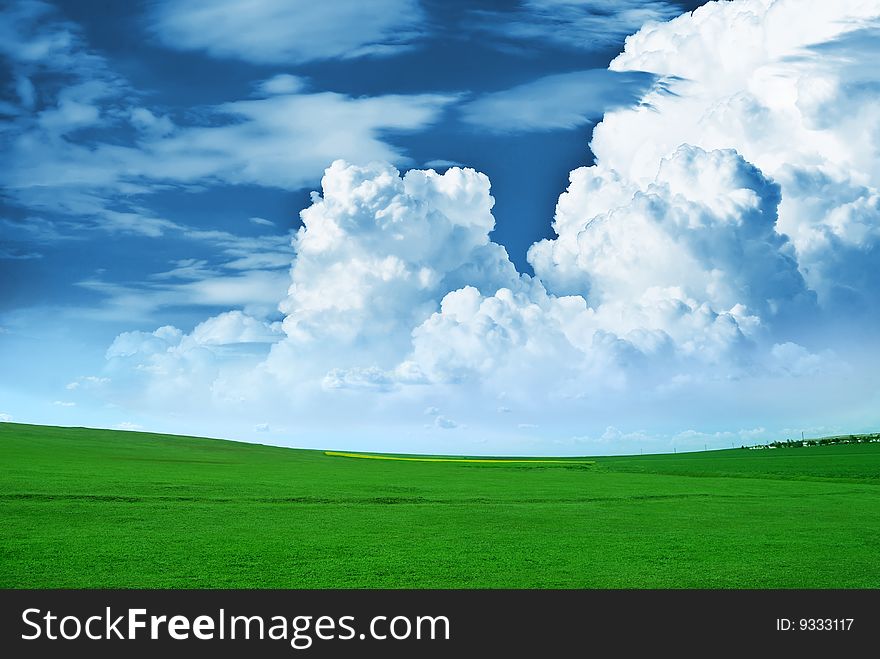 Landscape photo: meadow and clouds