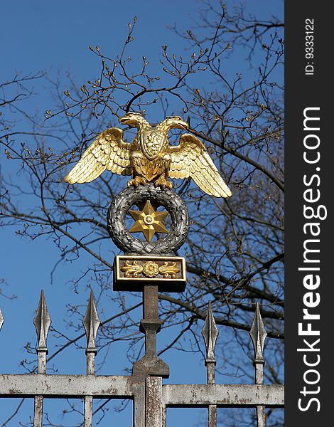 Golden eagle on the fence in Saint-Petersburgh, Russia