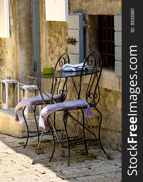 Chairs and table in a mediterran city. Chairs and table in a mediterran city