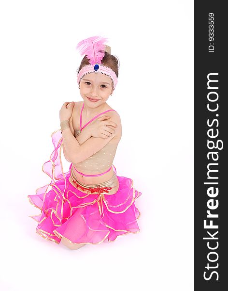 Girl in dress posing in studio on white background