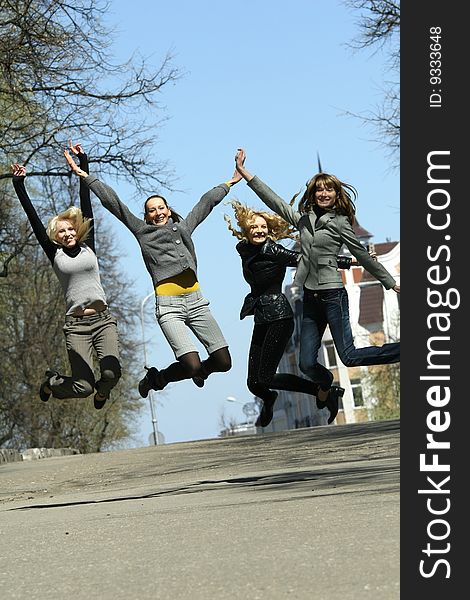 Group of girls jumping on the street. Group of girls jumping on the street