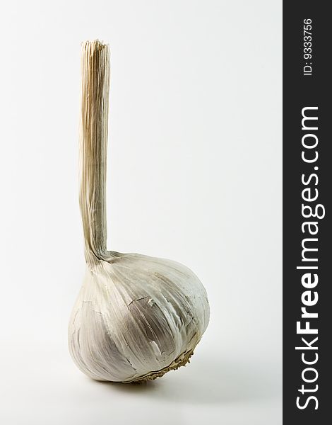 Delicious garlic on white background