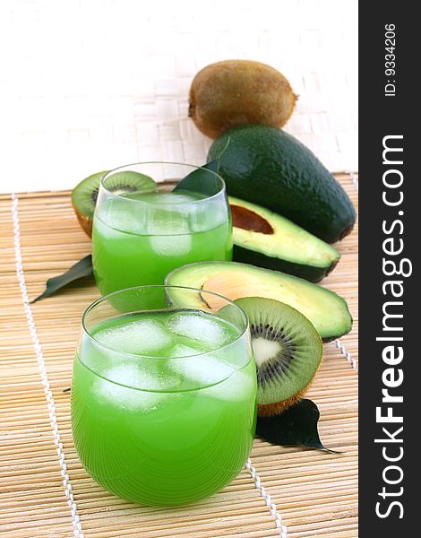 Avocado and avocado juice in a glass